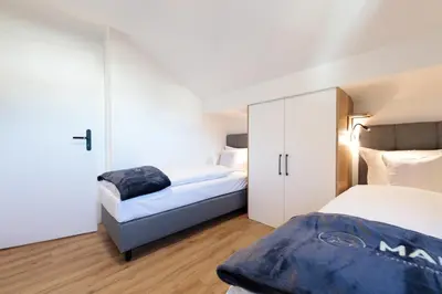 Ein Bett oder Betten in einem Zimmer der Unterkunft Heu22 Heuboden