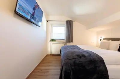 Ein Bett oder Betten in einem Zimmer der Unterkunft Heu22 Heuboden