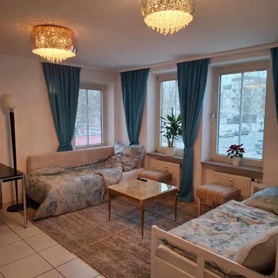 Ein Bett oder Betten in einem Zimmer der Unterkunft Apartroom München-Ost Berg-am-Laim