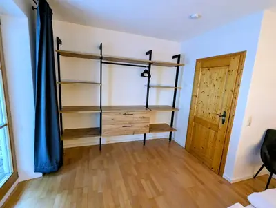 Ein Bett oder Betten in einem Zimmer der Unterkunft Geigerhof Bad Heilbrunn