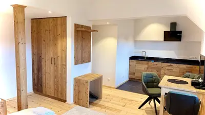 Ein Sitzbereich in der Unterkunft Vogelbauer Apartments