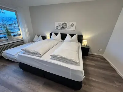 Ein Bett oder Betten in einem Zimmer der Unterkunft Gipfelbussi