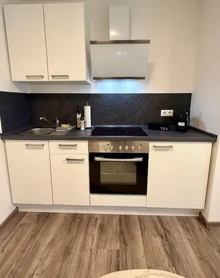 Küche/Küchenzeile in der Unterkunft Zentrumsnahe Wohnung - Tram, Amazon Prime und Self Check in