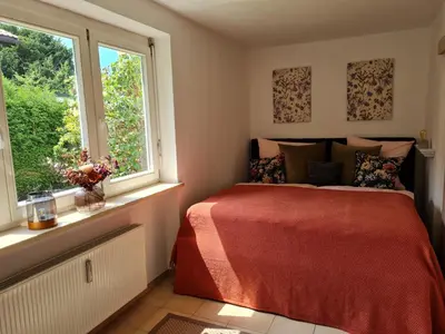 Ein Bett oder Betten in einem Zimmer der Unterkunft Ferienwohnung Katja II mit Kramerblick