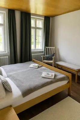 Ein Bett oder Betten in einem Zimmer der Unterkunft Kloster Altenhohenau