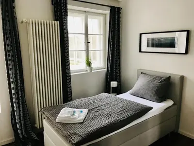 Ein Bett oder Betten in einem Zimmer der Unterkunft Kloster Altenhohenau