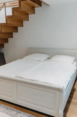 Ein Bett oder Betten in einem Zimmer der Unterkunft Feel-good house - roof terrace & parking included