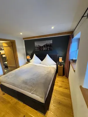 Ein Bett oder Betten in einem Zimmer der Unterkunft Ferienwohnung Tegernsee - Rottach-Egern - 3 Zimmer Wohnung - Terrasse - Self Check In