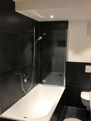 Ein Badezimmer in der Unterkunft Ferienwohnung Tegernsee - Rottach-Egern - 3 Zimmer Wohnung - Terrasse - Self Check In