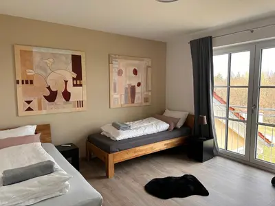 Ein Bett oder Betten in einem Zimmer der Unterkunft XXL Panoramablick mit gratis KönigsCard