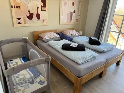 Ein Bett oder Betten in einem Zimmer der Unterkunft XXL Panoramablick mit gratis KönigsCard