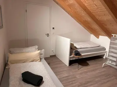 Ein Bett oder Betten in einem Zimmer der Unterkunft XXL Panoramablick mit gratis KönigsCard