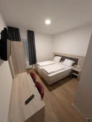 Ein Bett oder Betten in einem Zimmer der Unterkunft Hotel Shiva