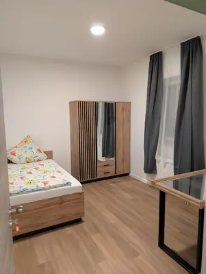 Ein Bett oder Betten in einem Zimmer der Unterkunft Hotel Shiva