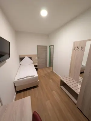 Ein Bett oder Betten in einem Zimmer der Unterkunft Hotel Shiva