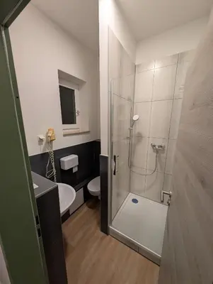 Ein Badezimmer in der Unterkunft Hotel Shiva