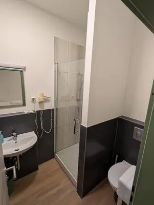 Ein Badezimmer in der Unterkunft Hotel Shiva