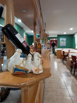 Ein Restaurant oder anderes Speiselokal in der Unterkunft Hotel Shiva