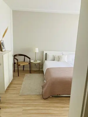 Ein Bett oder Betten in einem Zimmer der Unterkunft Oasis