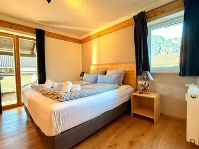 Ein Bett oder Betten in einem Zimmer der Unterkunft Berg-Faszination Alpspitze