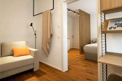 Ein Bett oder Betten in einem Zimmer der Unterkunft Direkt am Rathausplatz | Zentral gelegen