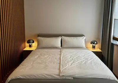 Ein Bett oder Betten in einem Zimmer der Unterkunft Direkt am Rathausplatz | Zentral gelegen
