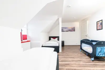 Ein Bett oder Betten in einem Zimmer der Unterkunft Ferienwohnungen Ammerwinkel