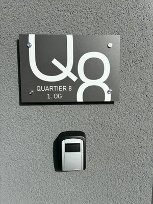 Ein Zertifikat, Auszeichnung, Logo oder anderes Dokument, das in der Unterkunft Quartier 8 - Ein-Zimmer-Apartment ausgestellt ist