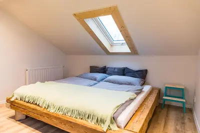 Ein Bett oder Betten in einem Zimmer der Unterkunft Ferienhaus am Eichberg