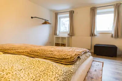 Ein Bett oder Betten in einem Zimmer der Unterkunft Ferienhaus am Eichberg