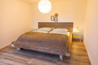 Ein Bett oder Betten in einem Zimmer der Unterkunft Ferienhaus am Eichberg