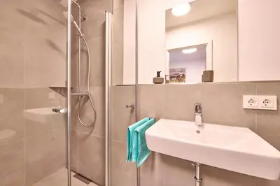 Ein Badezimmer in der Unterkunft Starnberger See Apartments