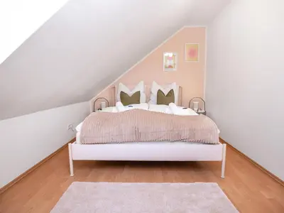 Ein Bett oder Betten in einem Zimmer der Unterkunft Therme Erding & Fly Apartment Berglern