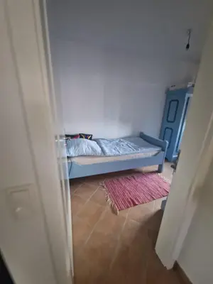Ein Bett oder Betten in einem Zimmer der Unterkunft Ferienwohnung Elektra