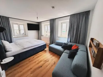 Ein Bett oder Betten in einem Zimmer der Unterkunft TheBlueInn