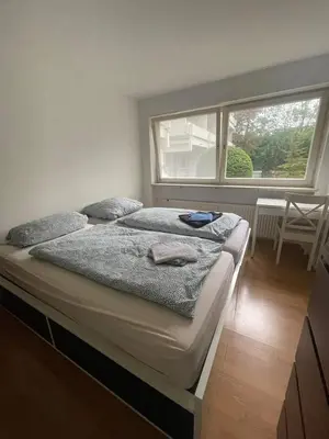 Ein Bett oder Betten in einem Zimmer der Unterkunft Cosy Accommodation - very central
