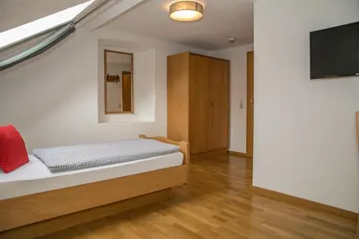 Ein Bett oder Betten in einem Zimmer der Unterkunft Jachentaler