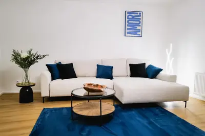 Ein Sitzbereich in der Unterkunft Modern City Apartment Parking WiFi 6 Pax