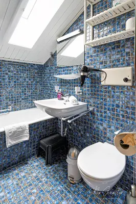 Ein Badezimmer in der Unterkunft KARWENDELHERZEN Ferienwohnung Mittenwald