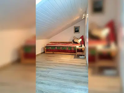 Ein Bett oder Betten in einem Zimmer der Unterkunft KARWENDELHERZEN Ferienwohnung Mittenwald