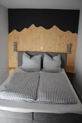 Ein Bett oder Betten in einem Zimmer der Unterkunft Schmugglereck