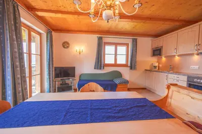 Ein Bett oder Betten in einem Zimmer der Unterkunft Ferienwohnungen Oberkollerhof