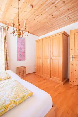 Ein Bett oder Betten in einem Zimmer der Unterkunft Ferienwohnungen Oberkollerhof