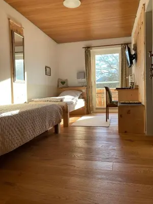 Ein Bett oder Betten in einem Zimmer der Unterkunft Gästehaus Margarita