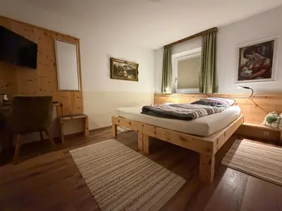 Ein Bett oder Betten in einem Zimmer der Unterkunft Gästehaus Margarita