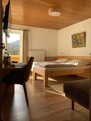 Ein Bett oder Betten in einem Zimmer der Unterkunft Gästehaus Margarita