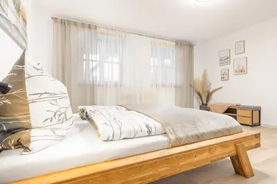 Ein Bett oder Betten in einem Zimmer der Unterkunft Auristela