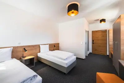 Ein Bett oder Betten in einem Zimmer der Unterkunft Seminar- und Schulungszentrum Kloster Furth
