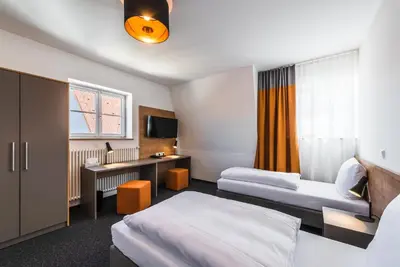 Ein Bett oder Betten in einem Zimmer der Unterkunft Seminar- und Schulungszentrum Kloster Furth