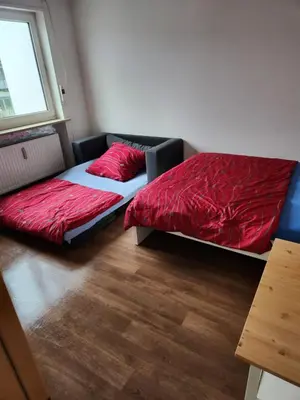 Ein Bett oder Betten in einem Zimmer der Unterkunft Einfache 1-Zimmer Wohnung in Bad Wörishofen